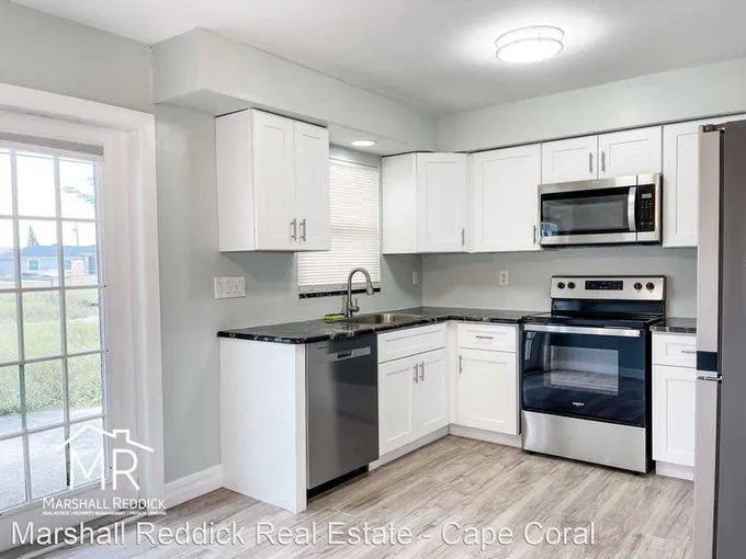 1213 NE 8th Ter  Updated 2 Bed 1 Bath Duplex in NE Cape for Sale