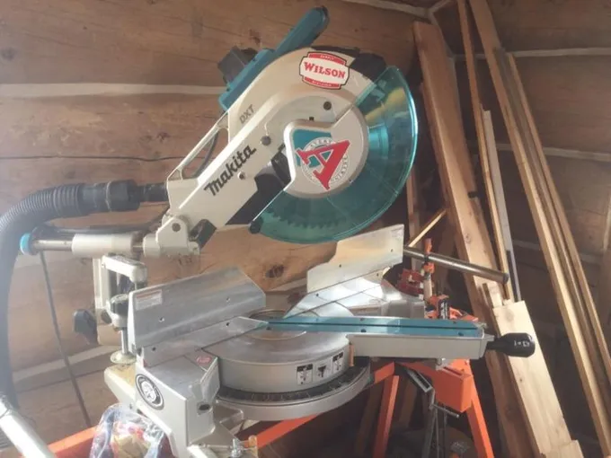 Makita 12 sliding miter saw with stand for Sale