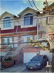Large & spacous 1 family attached home w/private drive for sale
