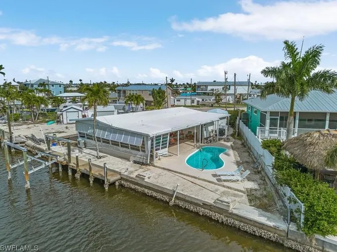 3977 Coconut Dr, Saint James City, FL 33956 - MLS 224004993 for Sale