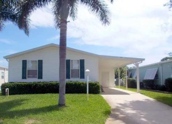 318 Macadamia Drive, Barefoot Bay, FL 32976 for Sale