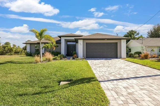 313 12th Pl, Cape Coral, FL 33993 - MLS 223086392 for Sale