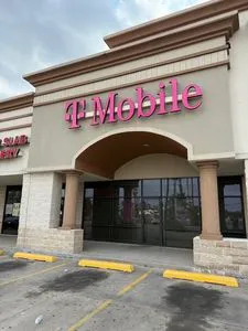 T-Mobile Ed Carey & Bus 77